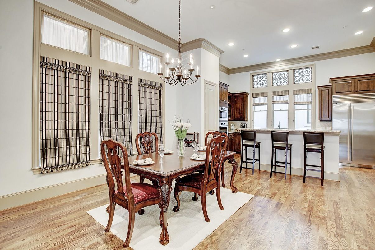 Chandelier, Dining room, Interior, Kitchen, Pendant Lights, Recessed Lighting, Stainless Steel Appliances, Wood Texture Flooring