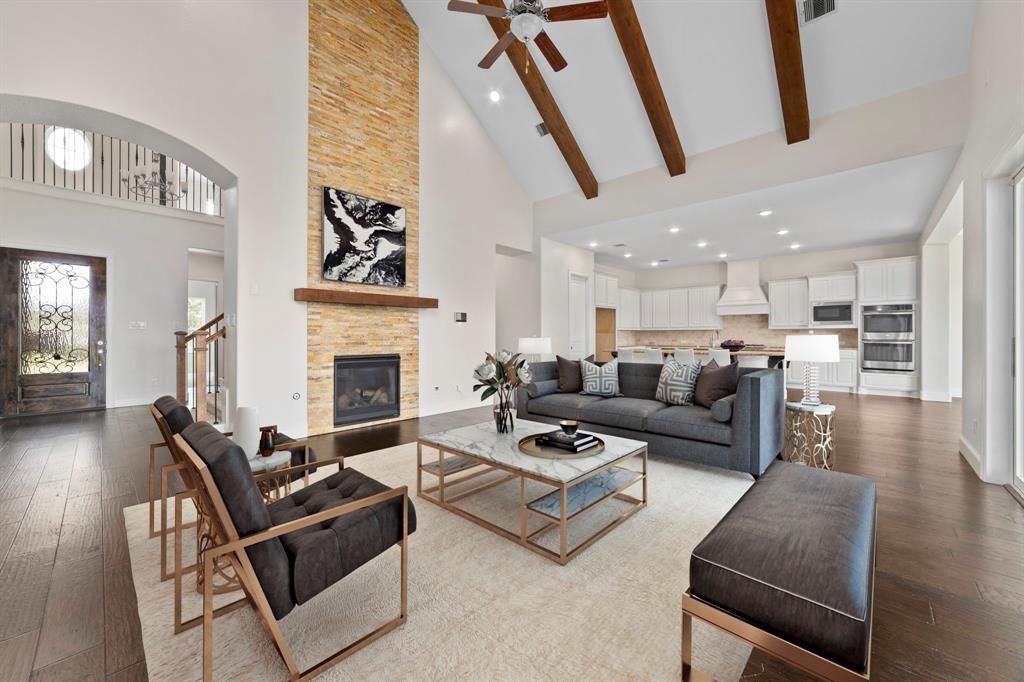 Fireplace, Interior, Kitchen, Living room, Recessed Lighting, Stainless Steel Appliances, Stone Walls, Wooden Beams, Wood Texture Flooring