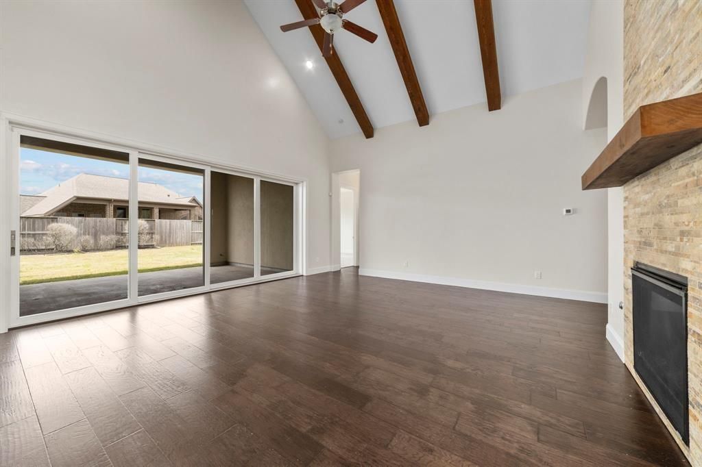 Empty room, Fireplace, Interior, Recessed Lighting, Wooden Beams, Wood Texture Flooring