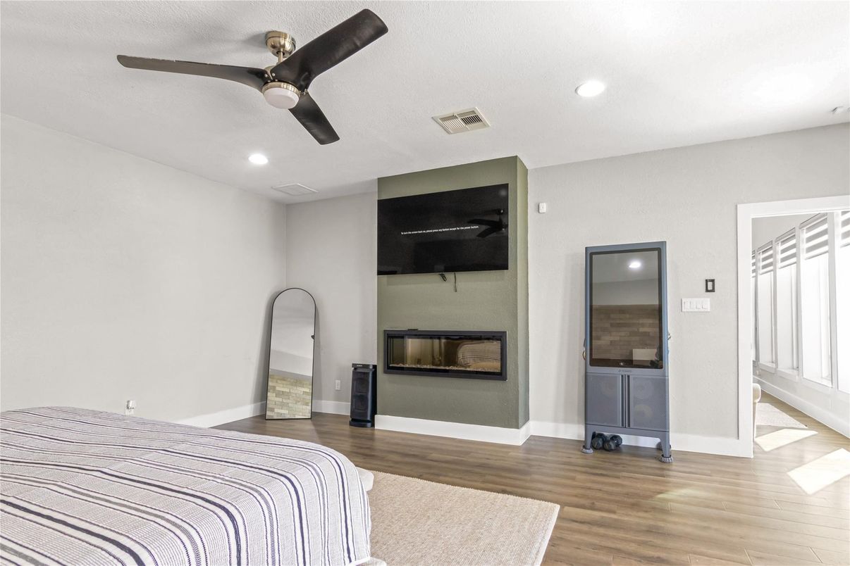 Bedroom, Fireplace, Interior, Recessed Lighting, Wood Texture Flooring