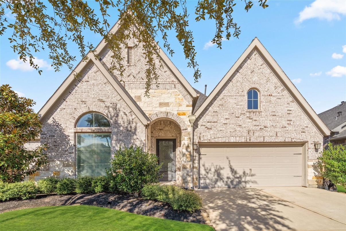 Attached, Exterior, Facade, Brick Facade, Brick Traditional