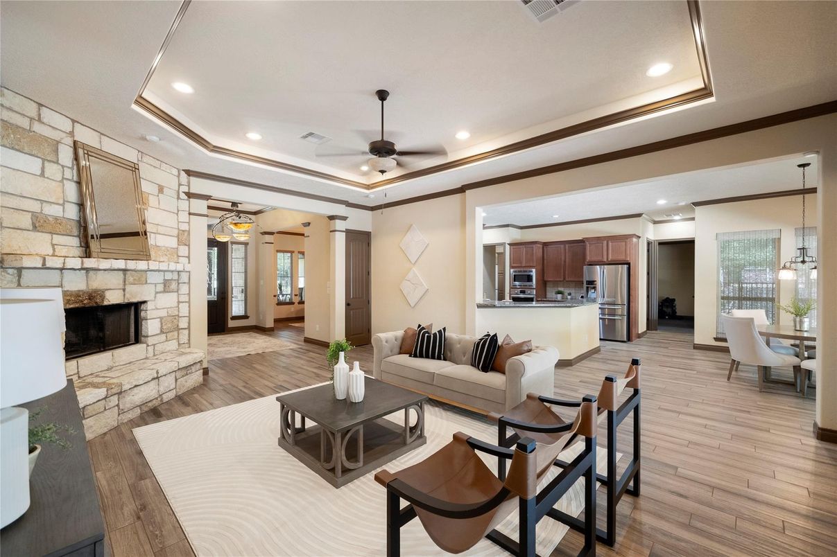 Dining room, Fireplace, Interior, Kitchen, Living room, Pendant Lights, Recessed Lighting, Stainless Steel Appliances, Stone Walls, Wood Texture Flooring