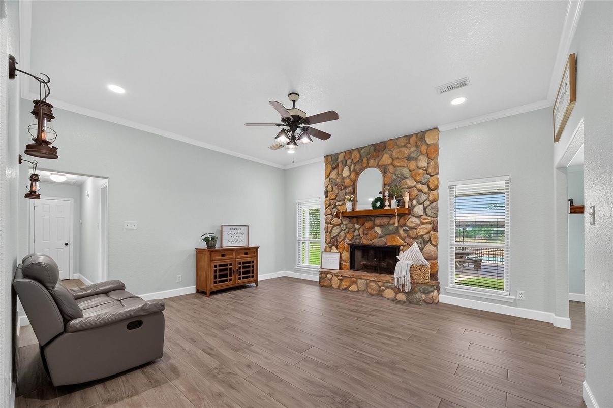 Fireplace, Interior, Pendant Lights, Recessed Lighting, Stone Walls, Wood Texture Flooring