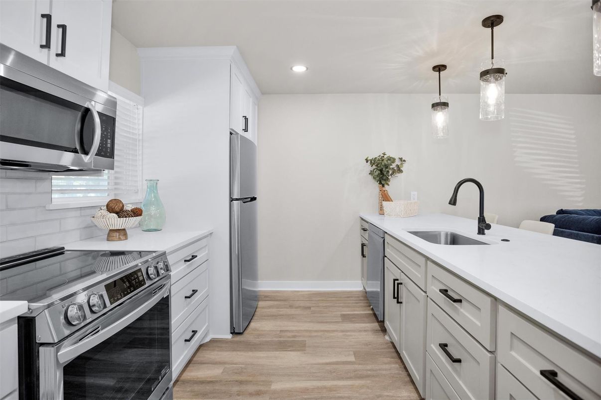 Interior, Kitchen, Pendant Lights, Recessed Lighting, Stainless Steel Appliances, Wood Texture Flooring