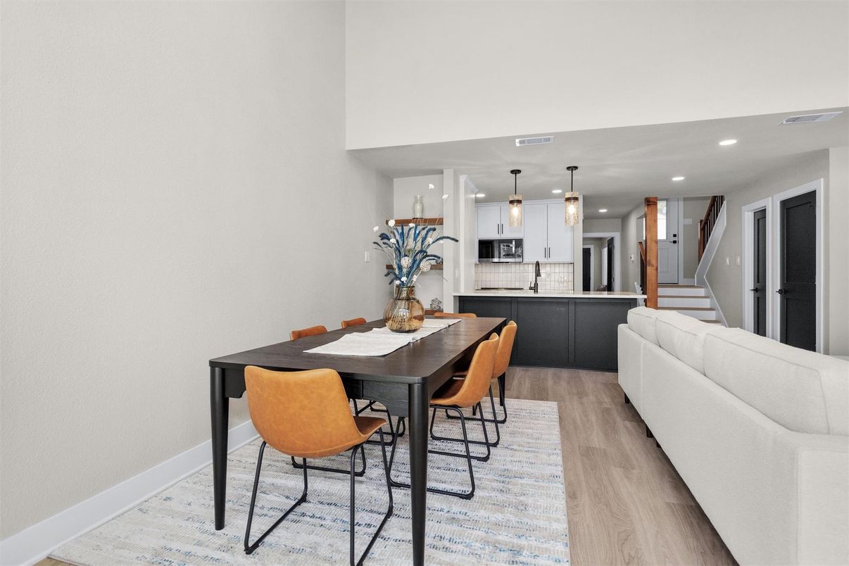 Dining room, Interior, Kitchen, Living room, Pendant Lights, Recessed Lighting, Stainless Steel Appliances, Wood Texture Flooring