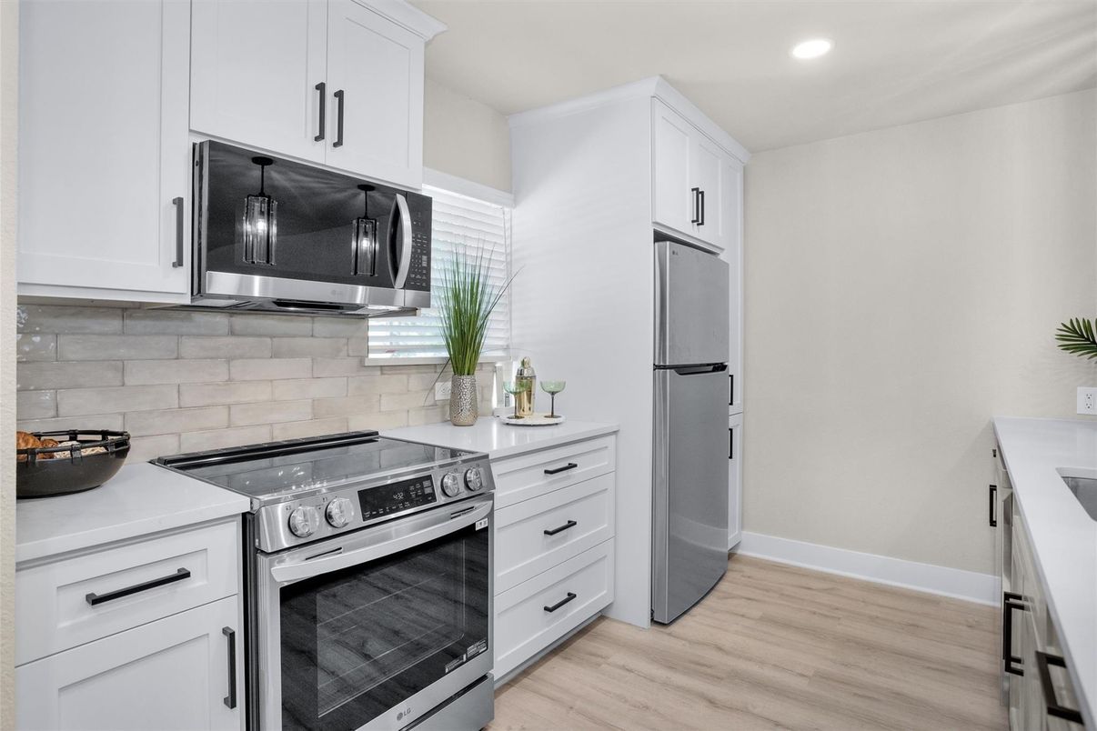 Interior, Kitchen, Recessed Lighting, Stainless Steel Appliances, Wood Texture Flooring