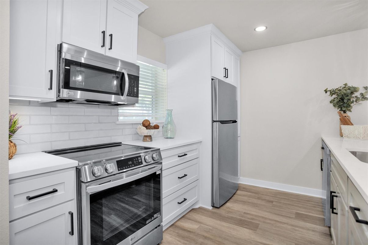 Interior, Kitchen, Recessed Lighting, Stainless Steel Appliances, Wood Texture Flooring