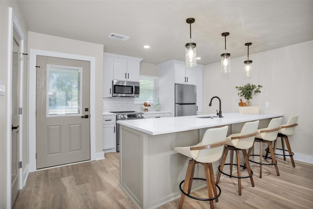 Interior, Kitchen, Pendant Lights, Recessed Lighting, Stainless Steel Appliances, Wood Texture Flooring