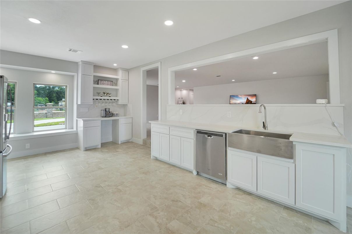 Interior, Kitchen, Marble Walls, Recessed Lighting, Stainless Steel Appliances