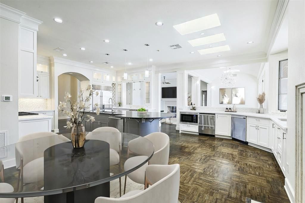 Dining room, Interior, Kitchen, Pendant Lights, Recessed Lighting, Stainless Steel Appliances, Wood Texture Flooring