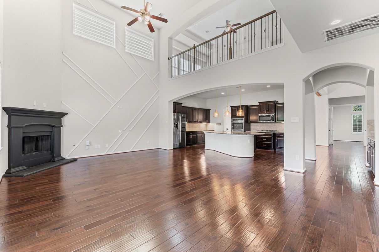 Fireplace, Interior, Kitchen, Pendant Lights, Recessed Lighting, Stainless Steel Appliances, Wood Texture Flooring