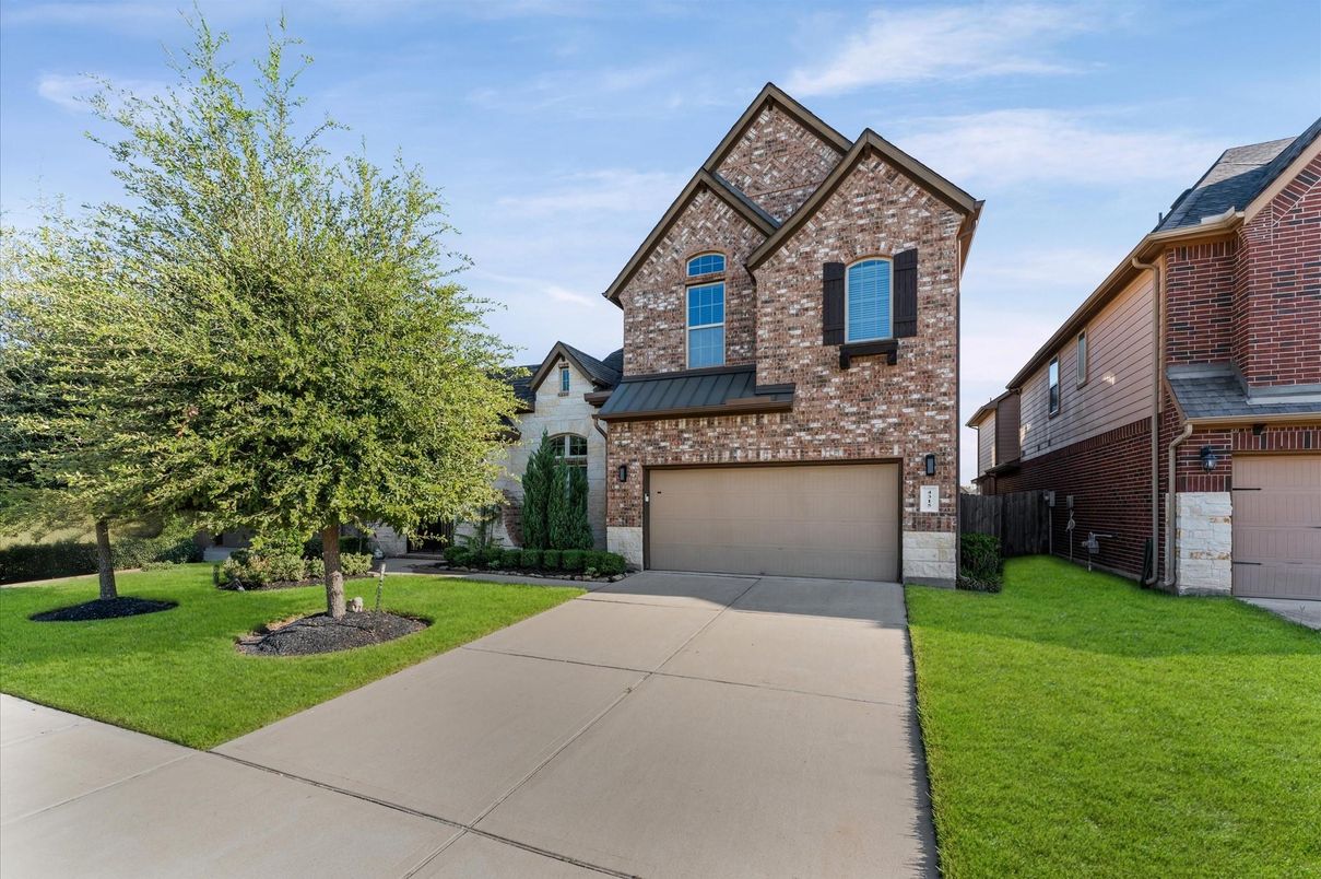 Attached, Exterior, Facade, Brick Facade, Brick Traditional