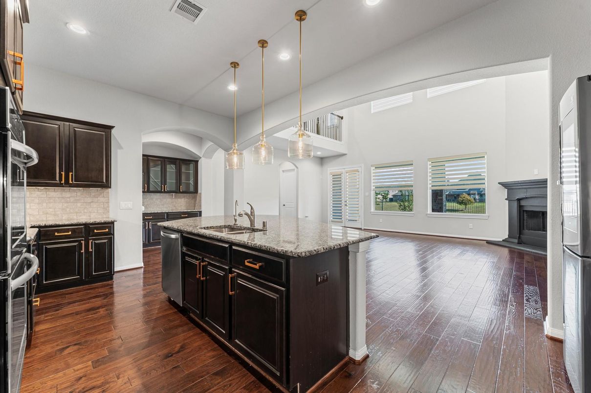 Fireplace, Interior, Kitchen, Pendant Lights, Recessed Lighting, Wood Texture Flooring