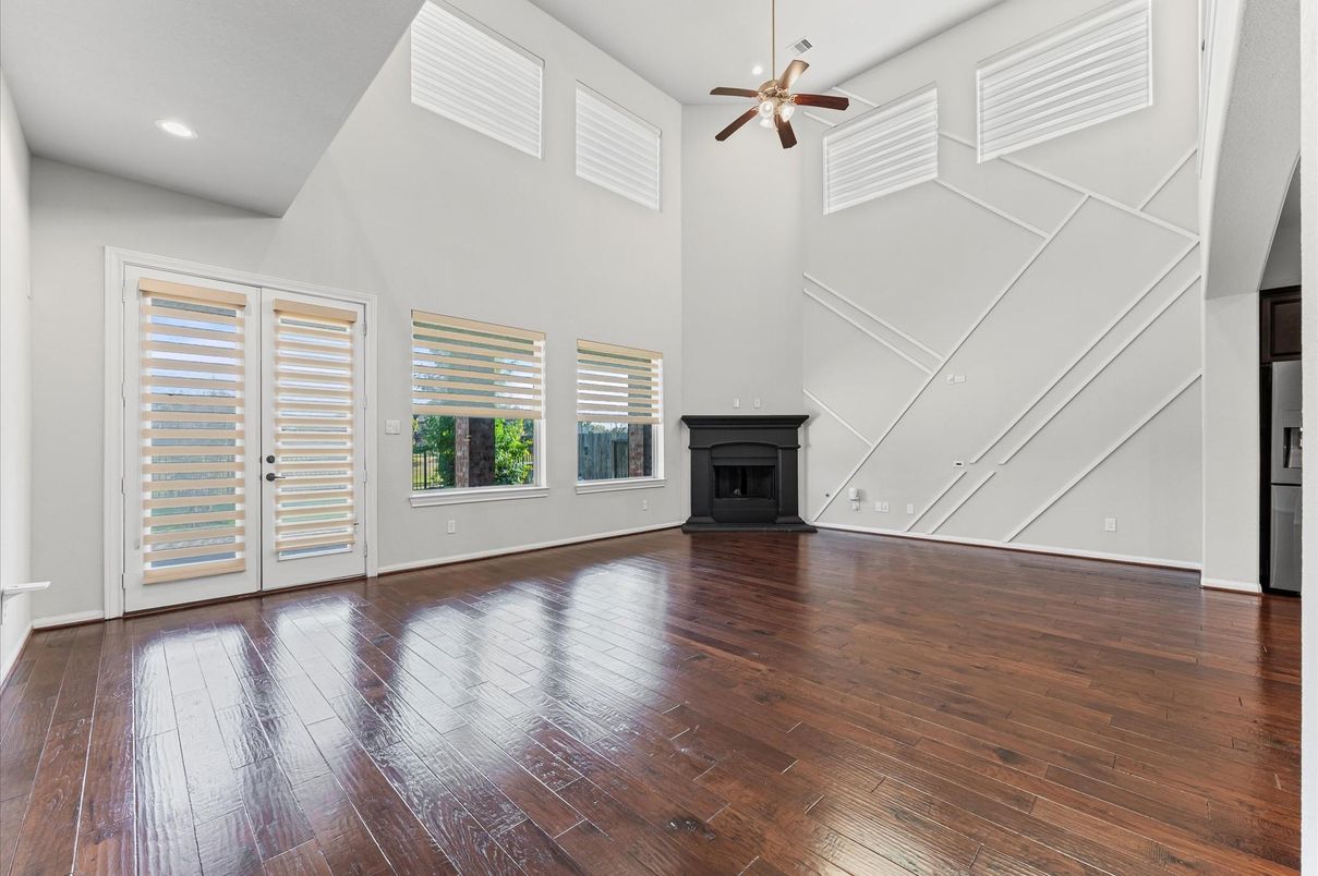 Empty room, Fireplace, Interior, Recessed Lighting, Wood Texture Flooring
