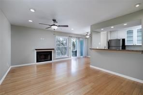 Empty room, Fireplace, Interior, Recessed Lighting, Wood Texture Flooring