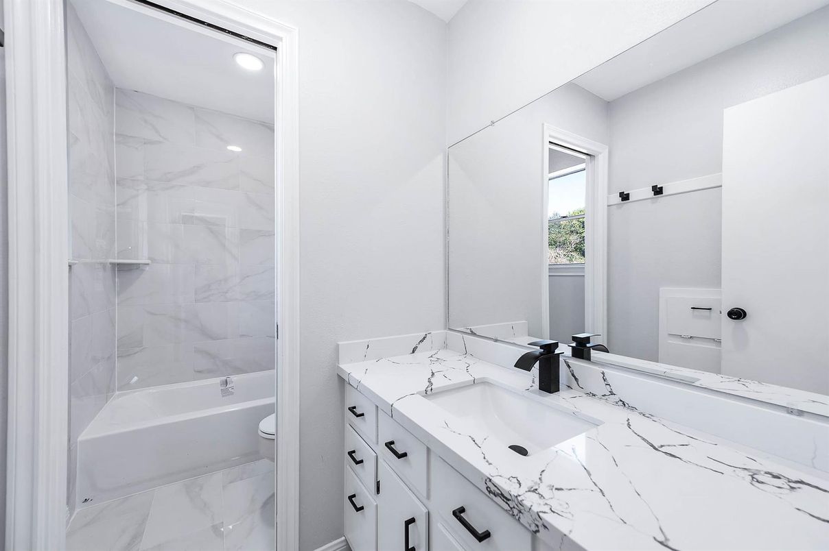 Bathroom, Dual Sink Vanities, Interior, Marble, Marble Walls, Recessed Lighting