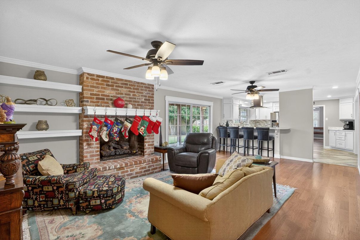 Fireplace, Interior, Kitchen, Living room, Recessed Lighting, Stone Walls, Wood Texture Flooring