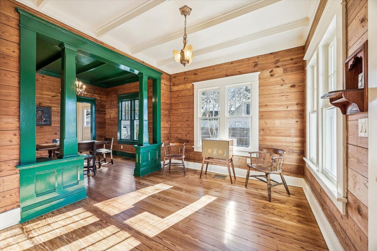 Dining room, Fireplace, Interior, Pendant Lights, Stone Walls, Wood Texture Flooring, Wooden Walls