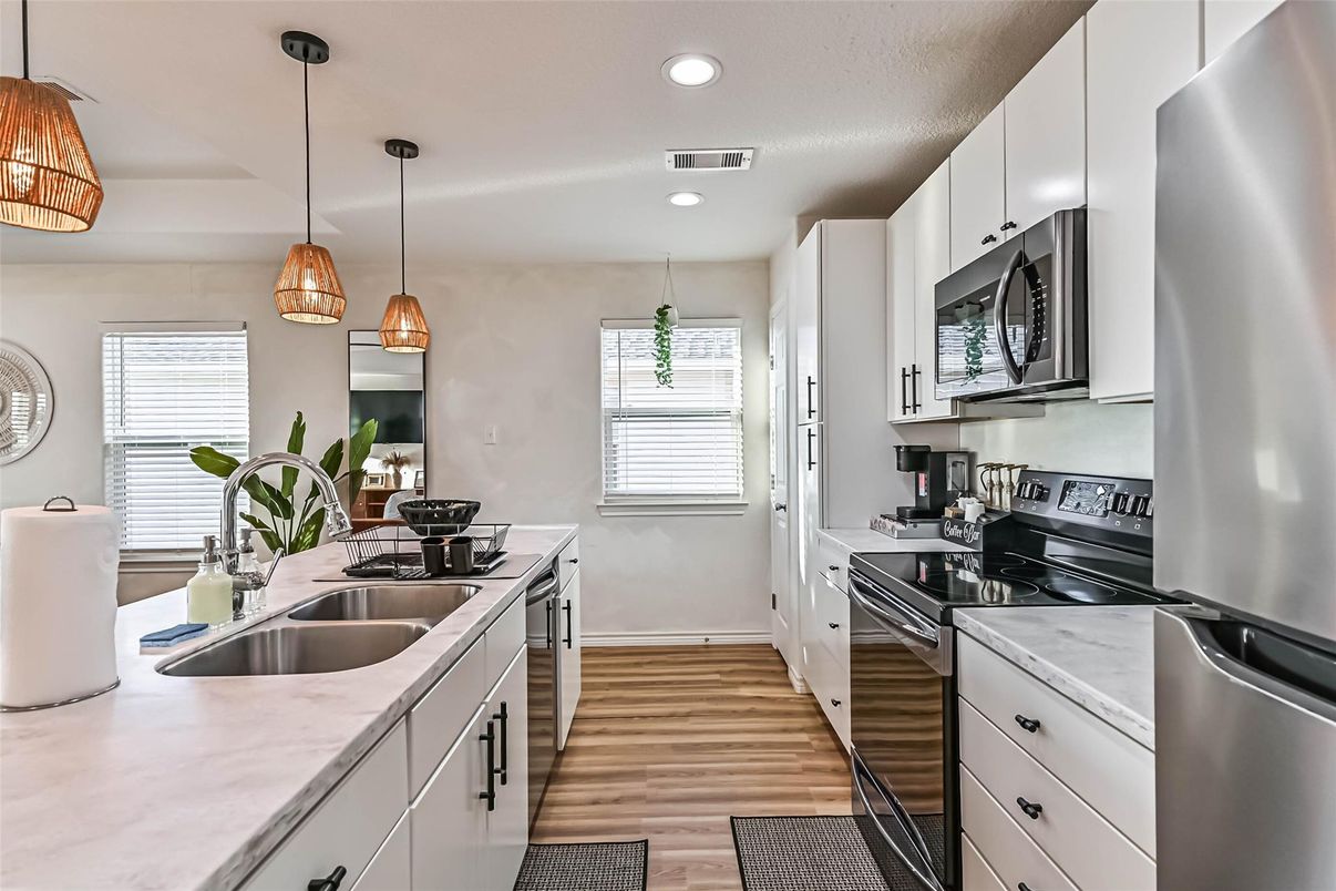 Interior, Kitchen, Pendant Lights, Recessed Lighting, Stainless Steel Appliances, Wood Texture Flooring