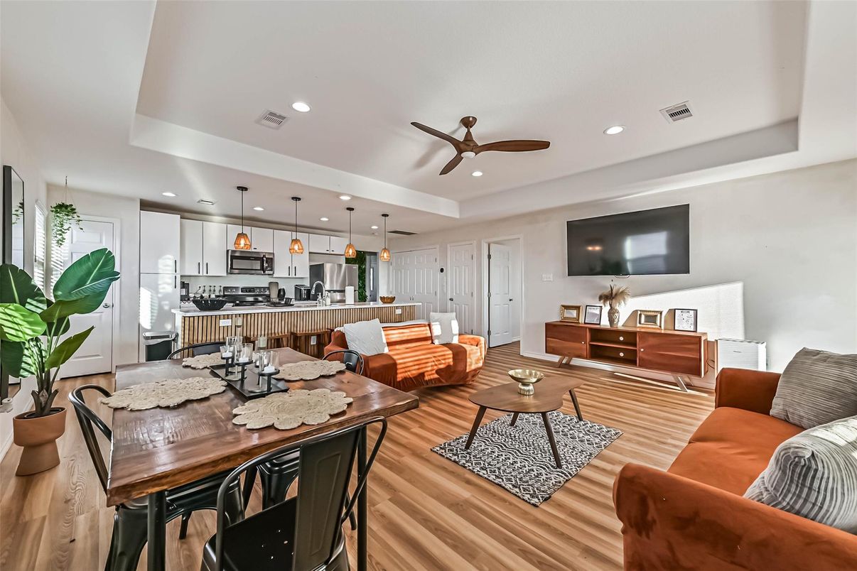 Dining room, Interior, Kitchen, Living room, Pendant Lights, Recessed Lighting, Stainless Steel Appliances, Wood Texture Flooring