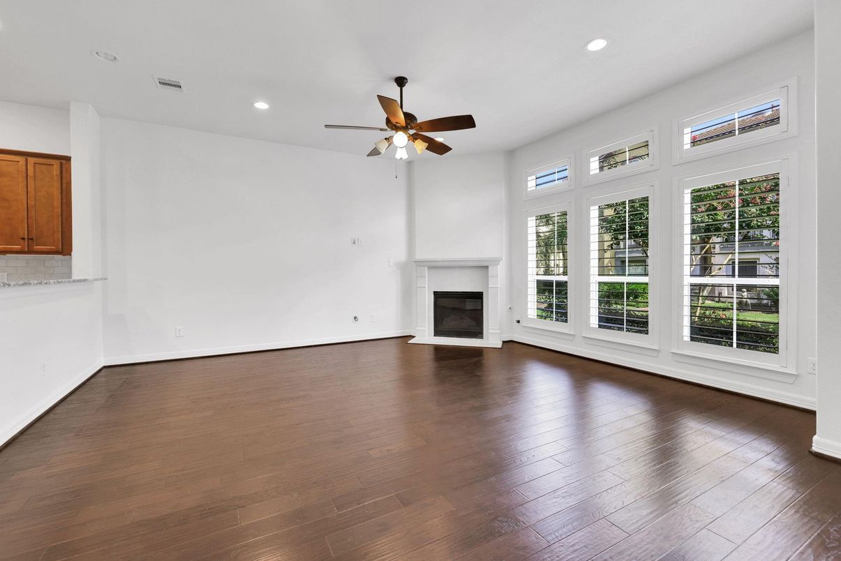 Empty room, Fireplace, Interior, Recessed Lighting, Wood Texture Flooring