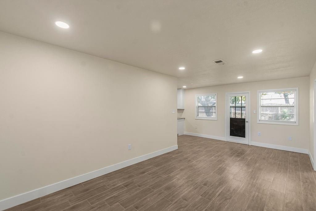Empty room, Fireplace, Interior, Recessed Lighting, Wood Texture Flooring