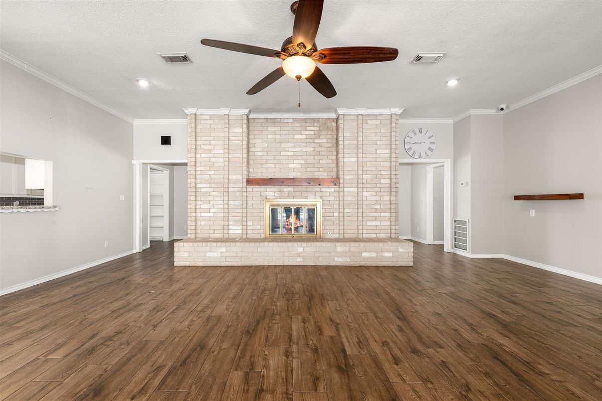 Empty room, Fireplace, Interior, Recessed Lighting, Wood Texture Flooring