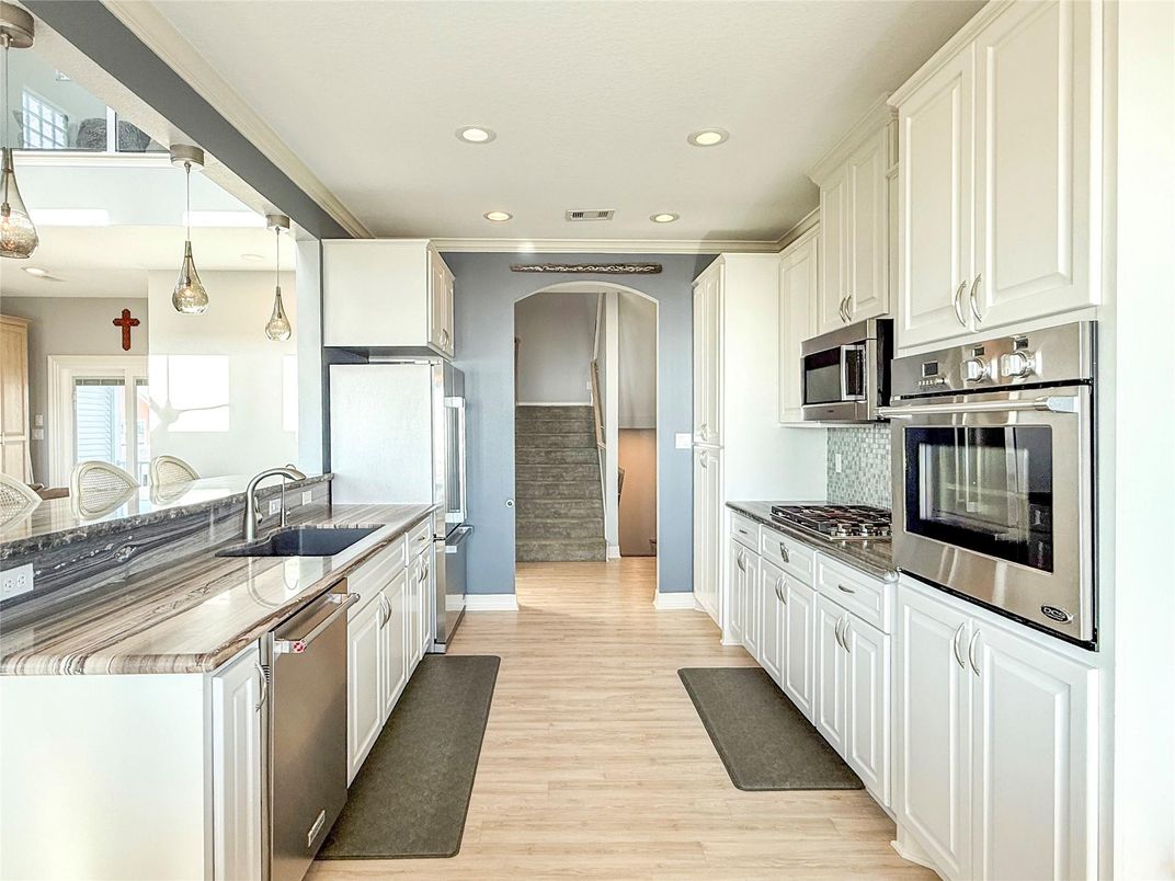 Interior, Kitchen, Pendant Lights, Recessed Lighting, Stainless Steel Appliances, Wood Texture Flooring
