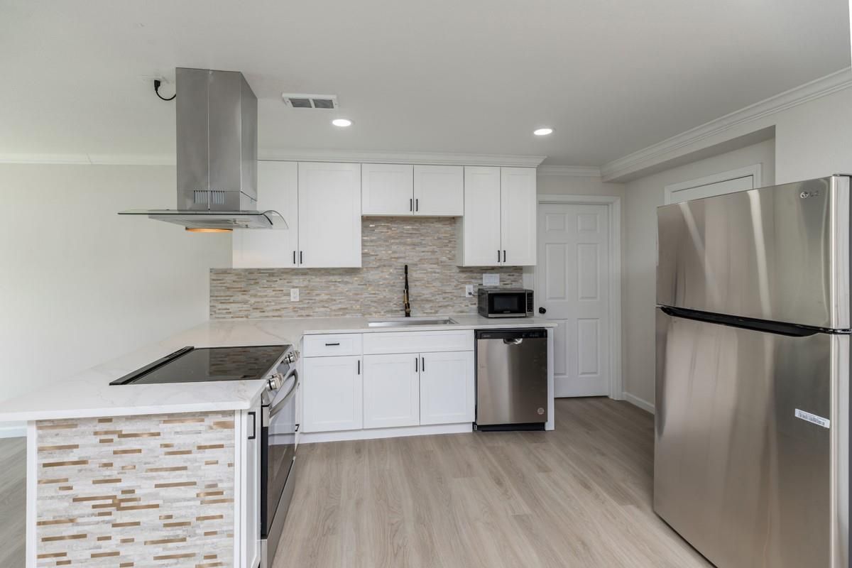 Interior, Kitchen, Recessed Lighting, Stainless Steel Appliances, Wood Texture Flooring