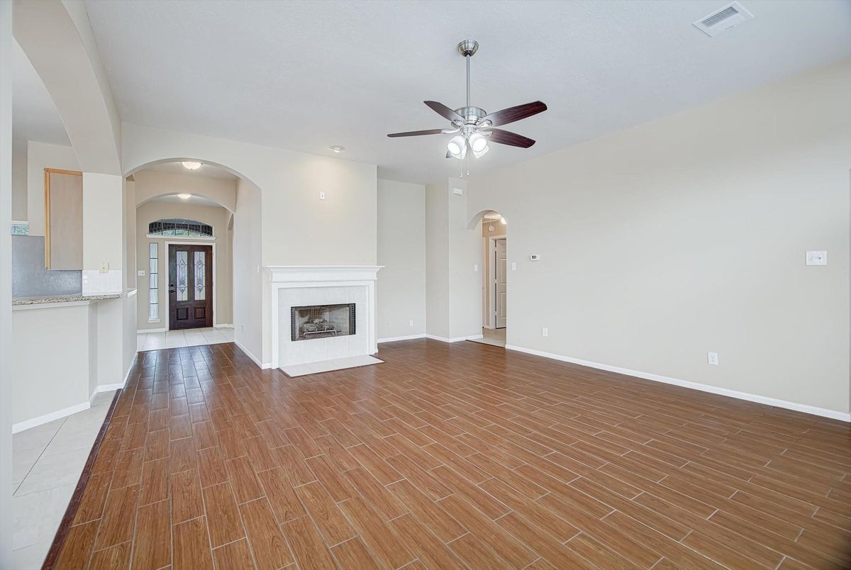 Empty room, Fireplace, Interior, Recessed Lighting, Wood Texture Flooring