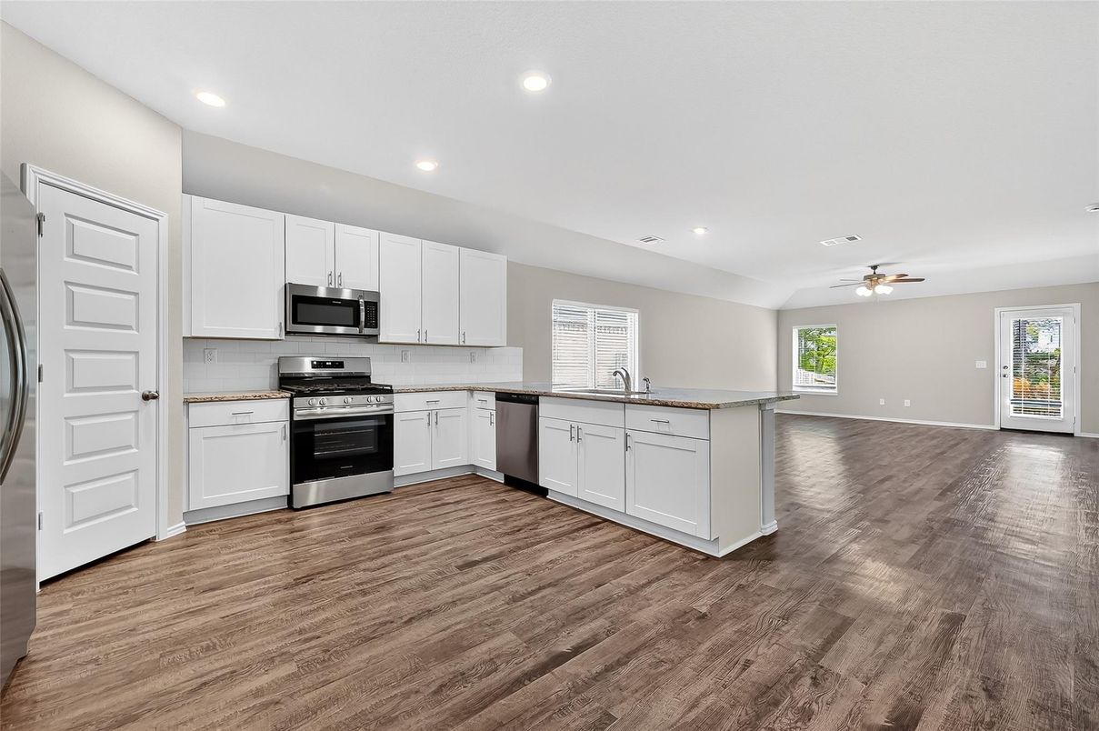 Interior, Kitchen, Recessed Lighting, Stainless Steel Appliances, Wood Texture Flooring