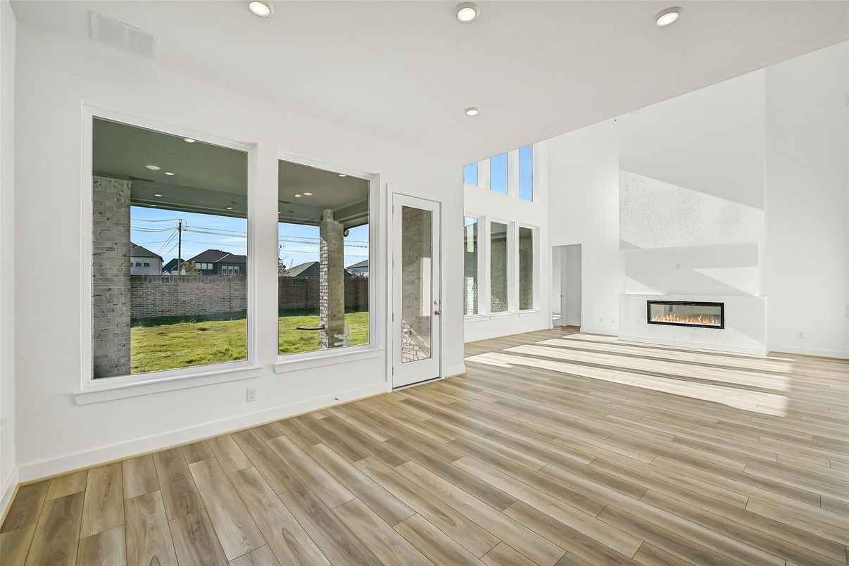 Empty room, Fireplace, Interior, Recessed Lighting, Wood Texture Flooring