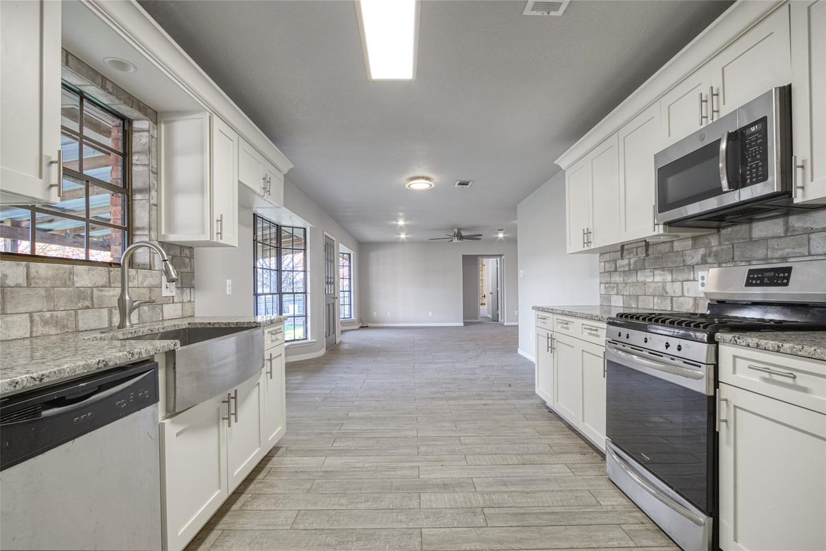 Interior, Kitchen, Recessed Lighting, Stainless Steel Appliances, Wood Texture Flooring