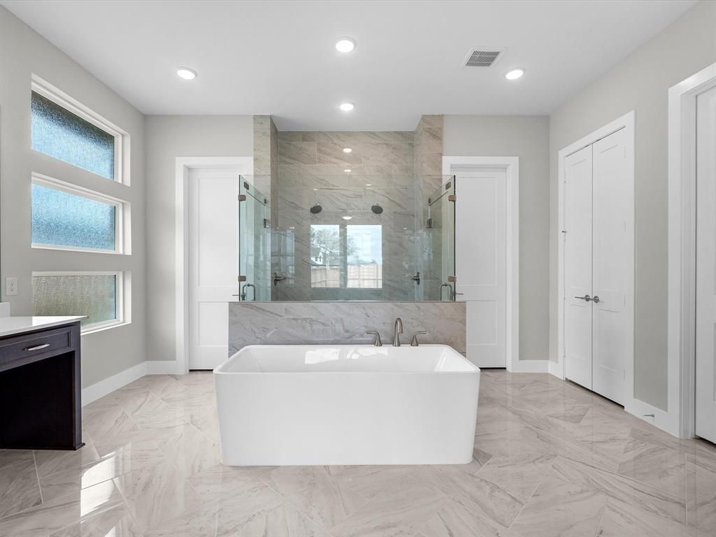 Bathroom, Free Standing Baths, Glass Shower, Interior, Marble, Marble Walls, Recessed Lighting