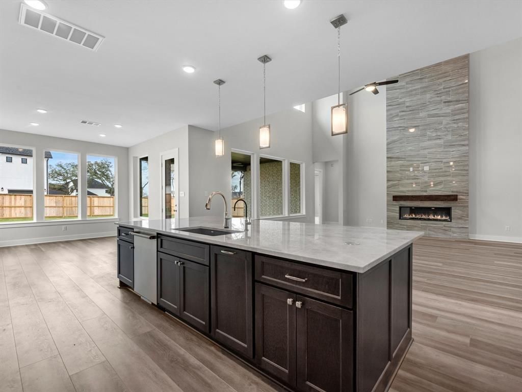 Fireplace, Interior, Kitchen, Pendant Lights, Recessed Lighting, Wood Texture Flooring