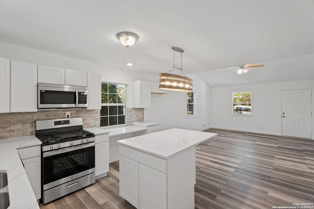Interior, Kitchen, Pendant Lights, Recessed Lighting, Stainless Steel Appliances, Wood Texture Flooring