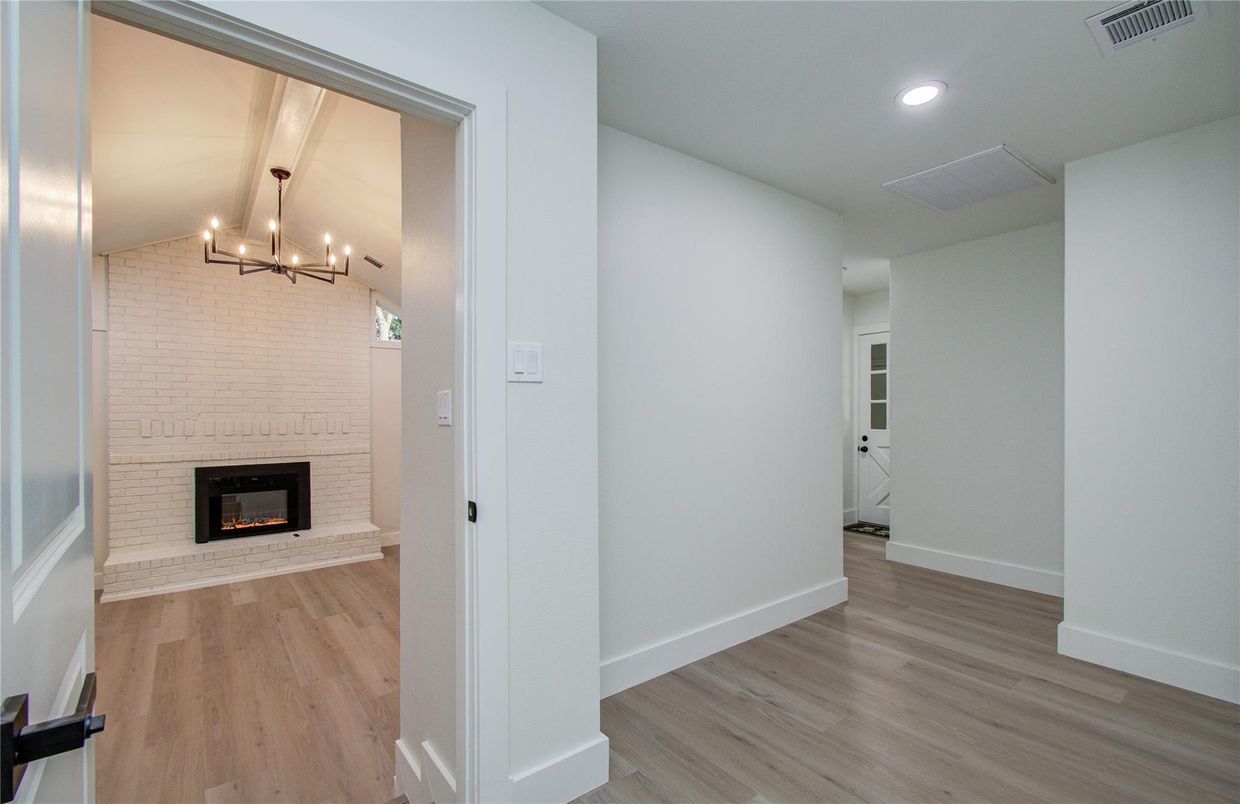 Chandelier, Fireplace, Interior, Recessed Lighting, Wood Texture Flooring