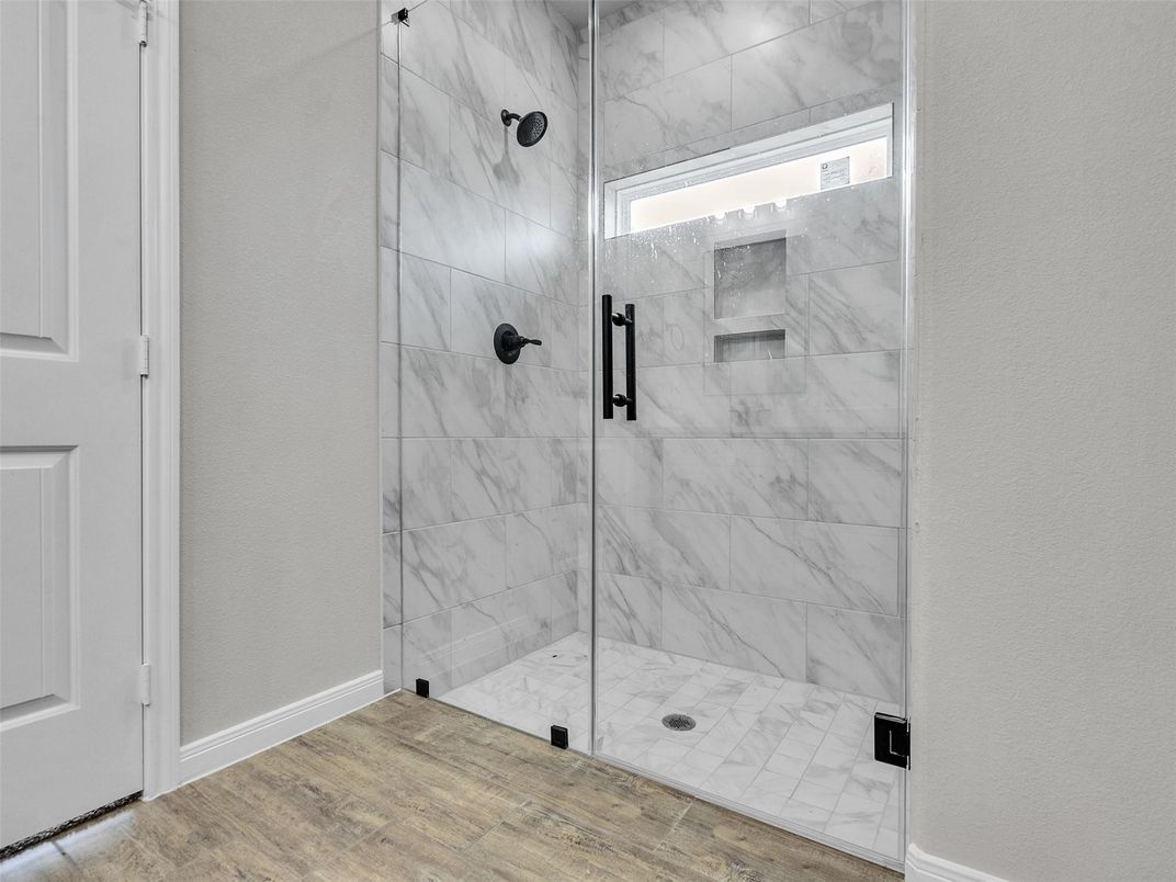 Bathroom, Glass Shower, Interior, Marble Walls, Wood Texture Flooring