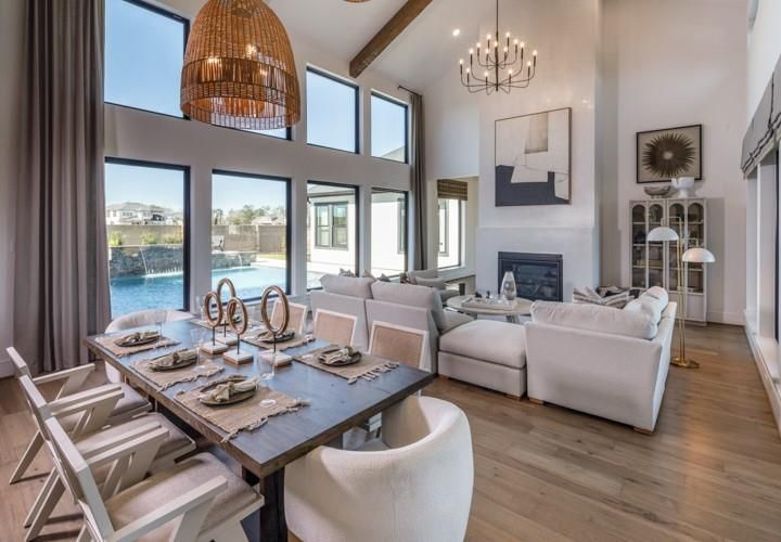 Chandelier, Dining room, Fireplace, Interior, Living room, Pendant Lights, Recessed Lighting, Wooden Beams, Wood Texture Flooring