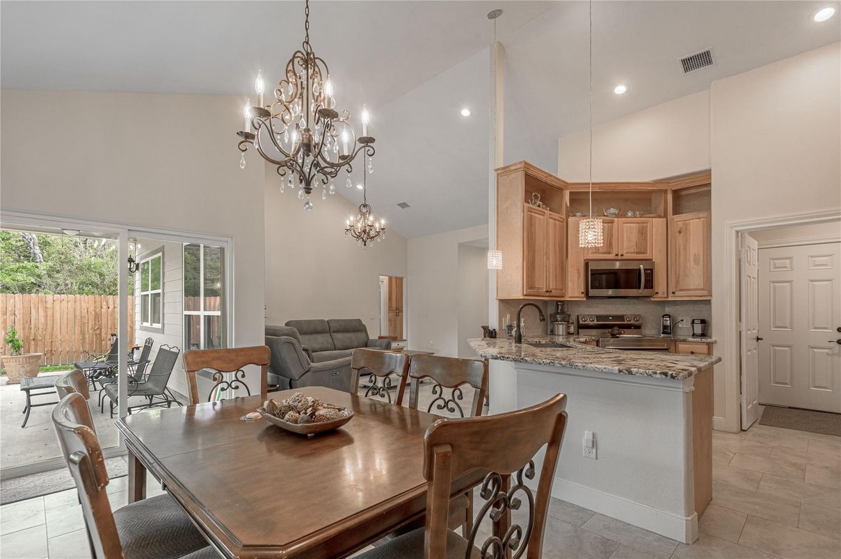 Chandelier, Dining room, Interior, Kitchen, Pendant Lights, Recessed Lighting, Stainless Steel Appliances