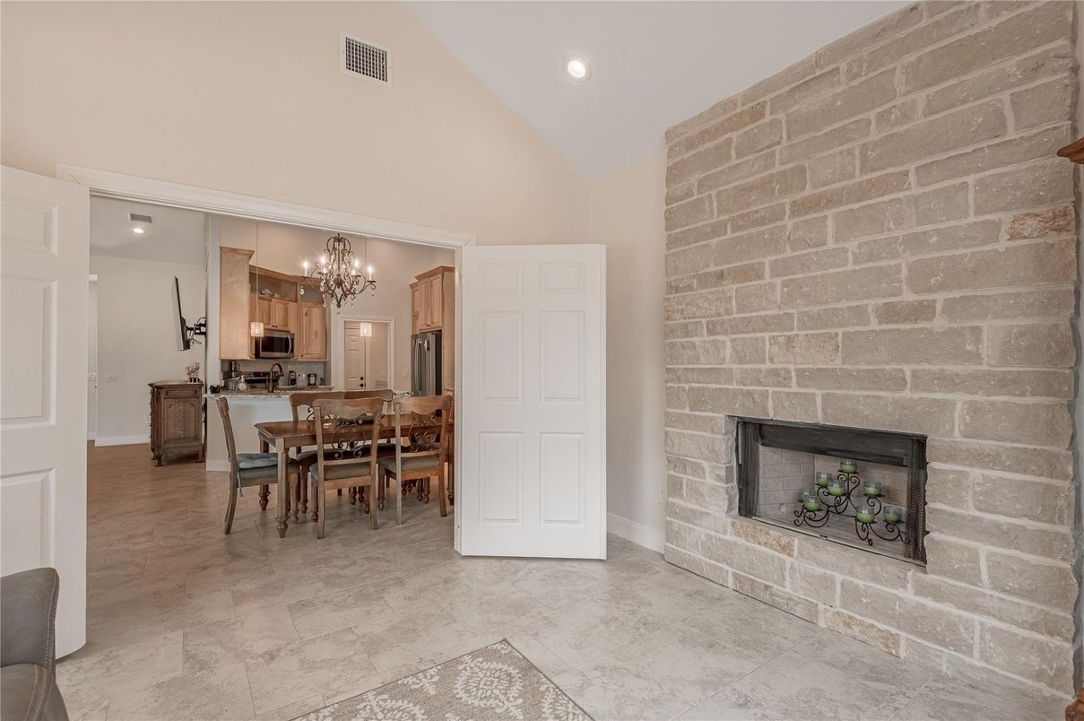 Chandelier, Dining room, Fireplace, Interior, Kitchen, Recessed Lighting, Stone Walls