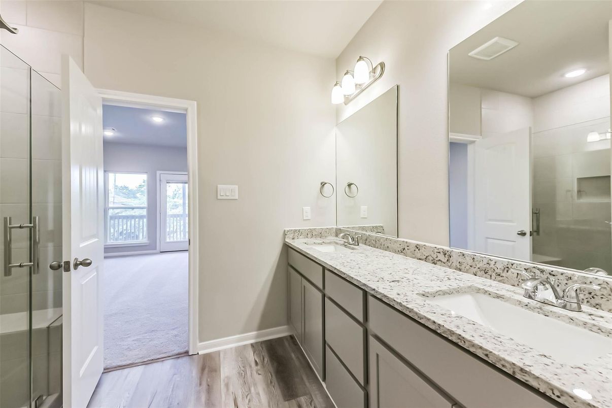 Bathroom, Dual Sink Vanities, Glass Shower, Interior, Recessed Lighting, Wood Texture Flooring