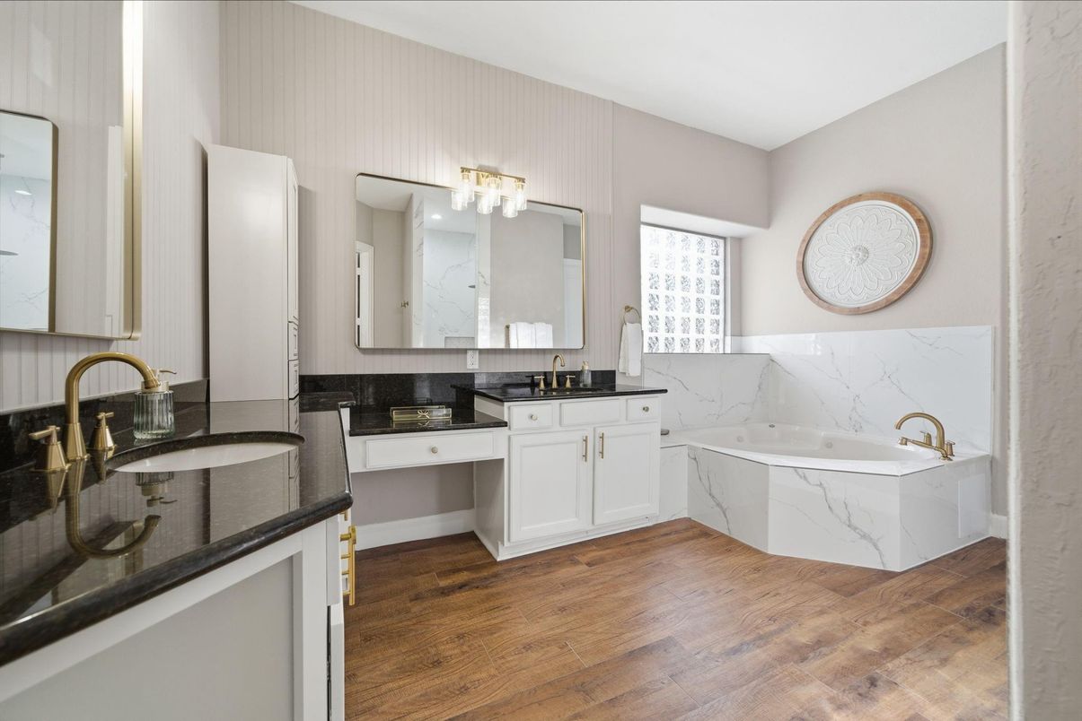 Bathroom, Dual Sink Vanities, Interior, Marble Walls, Wood Texture Flooring
