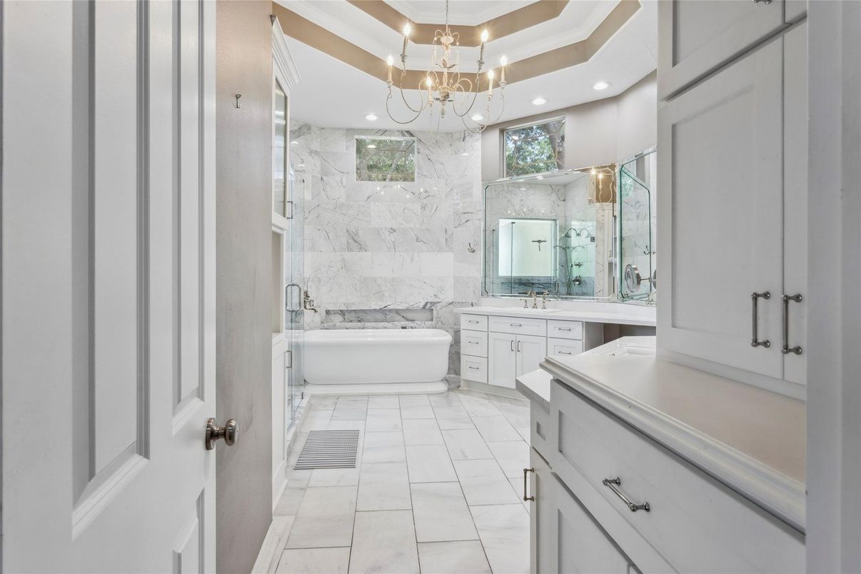 Bathroom, Chandelier, Dual Sink Vanities, Free Standing Baths, Interior, Marble, Marble Walls, Recessed Lighting