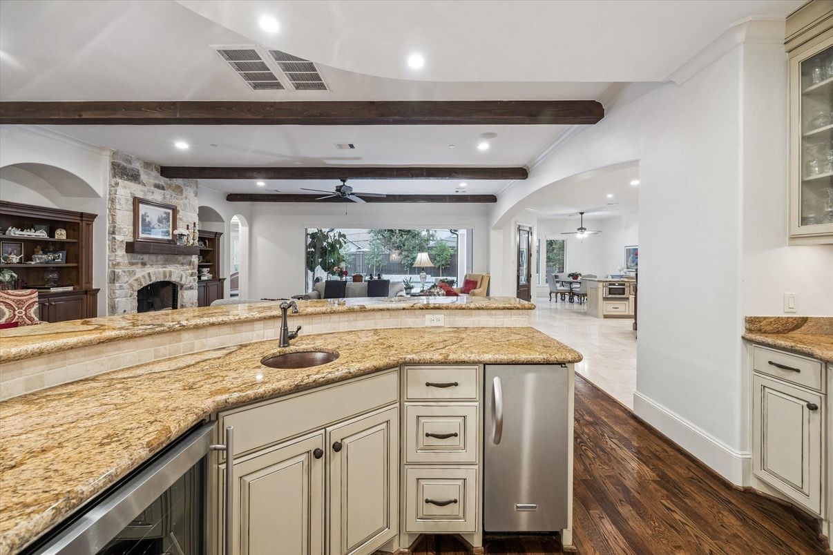 Dining room, Fireplace, Interior, Recessed Lighting, Stone Walls, Wooden Beams, Wood Texture Flooring