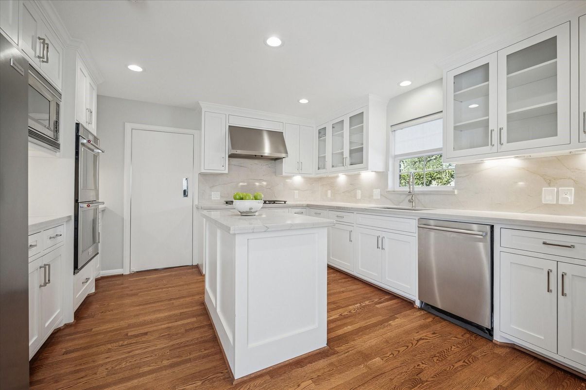 Interior, Kitchen, Marble Walls, Recessed Lighting, Stainless Steel Appliances, Wood Texture Flooring