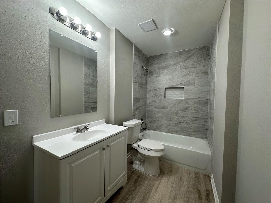 Bathroom, Interior, Marble Walls, Recessed Lighting, Wood Texture Flooring