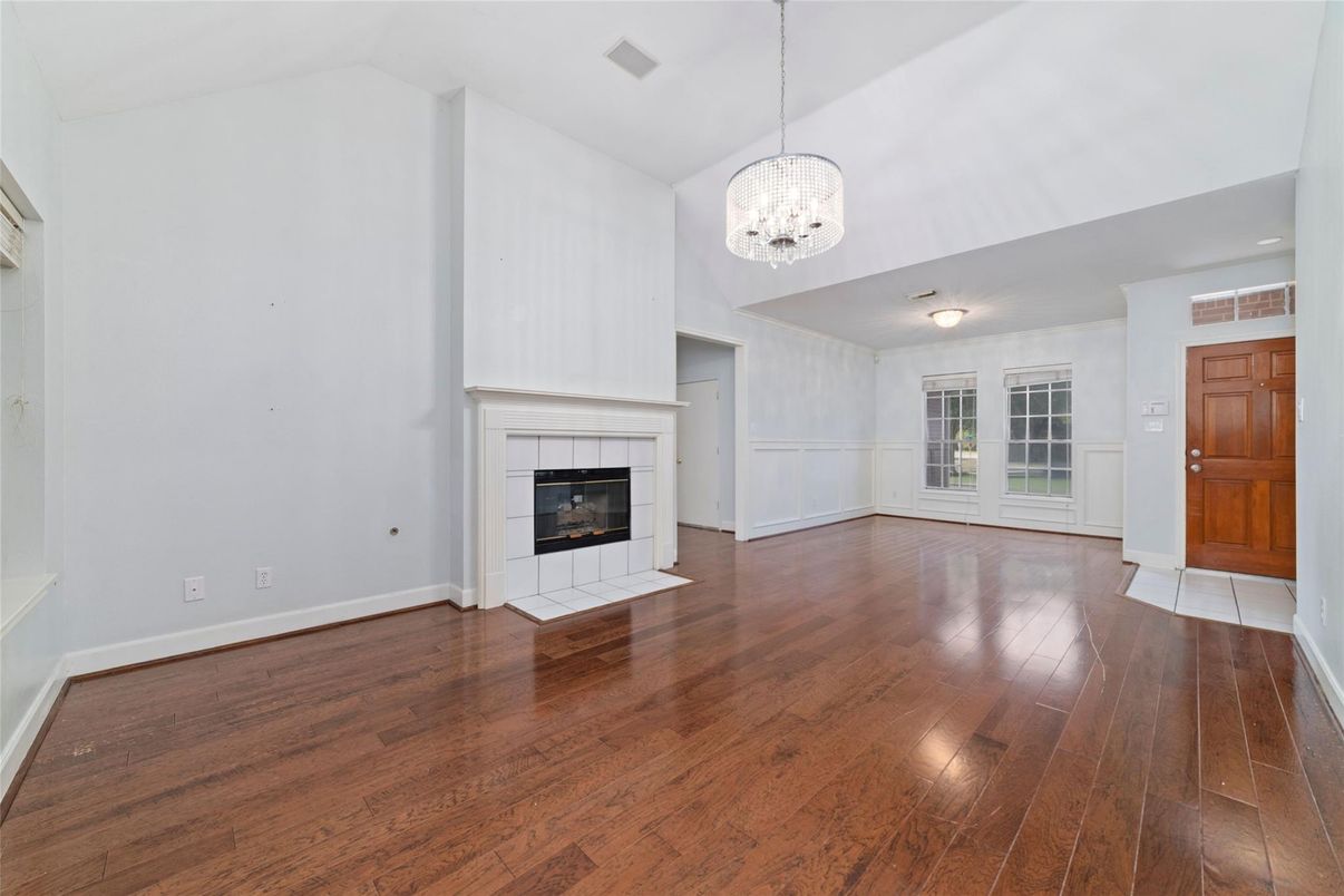 Chandelier, Empty room, Fireplace, Interior, Wood Texture Flooring