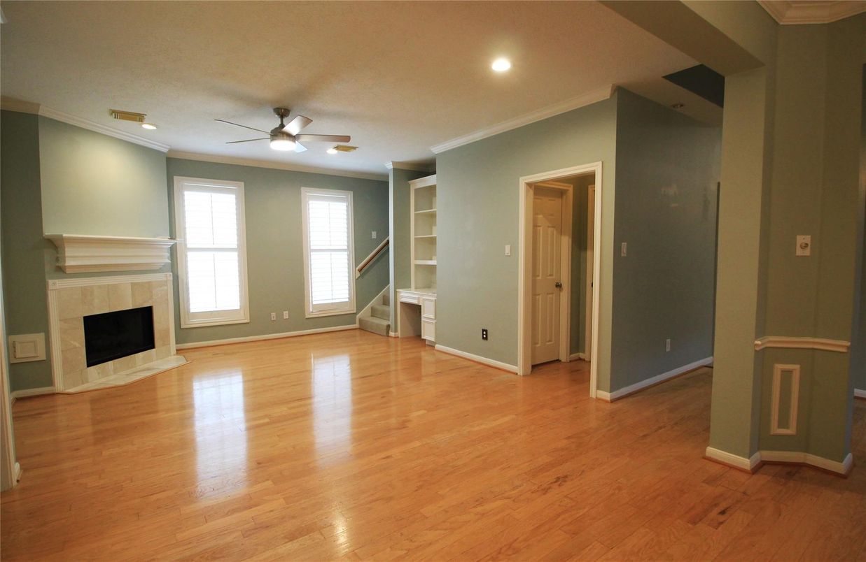 Empty room, Fireplace, Interior, Recessed Lighting, Wood Texture Flooring