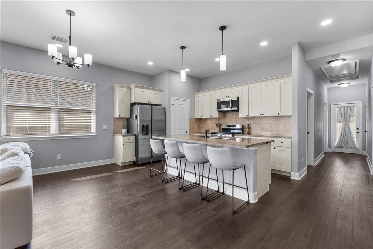 Chandelier, Interior, Kitchen, Pendant Lights, Recessed Lighting, Stainless Steel Appliances, Wood Texture Flooring